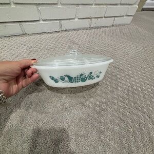 Vintage Glasbake Casserole Dish with lid, teal fruit pattern.